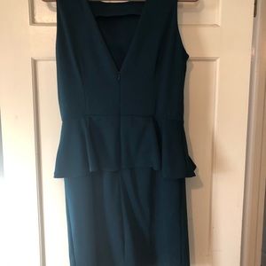 Dark emerald green peplum dress